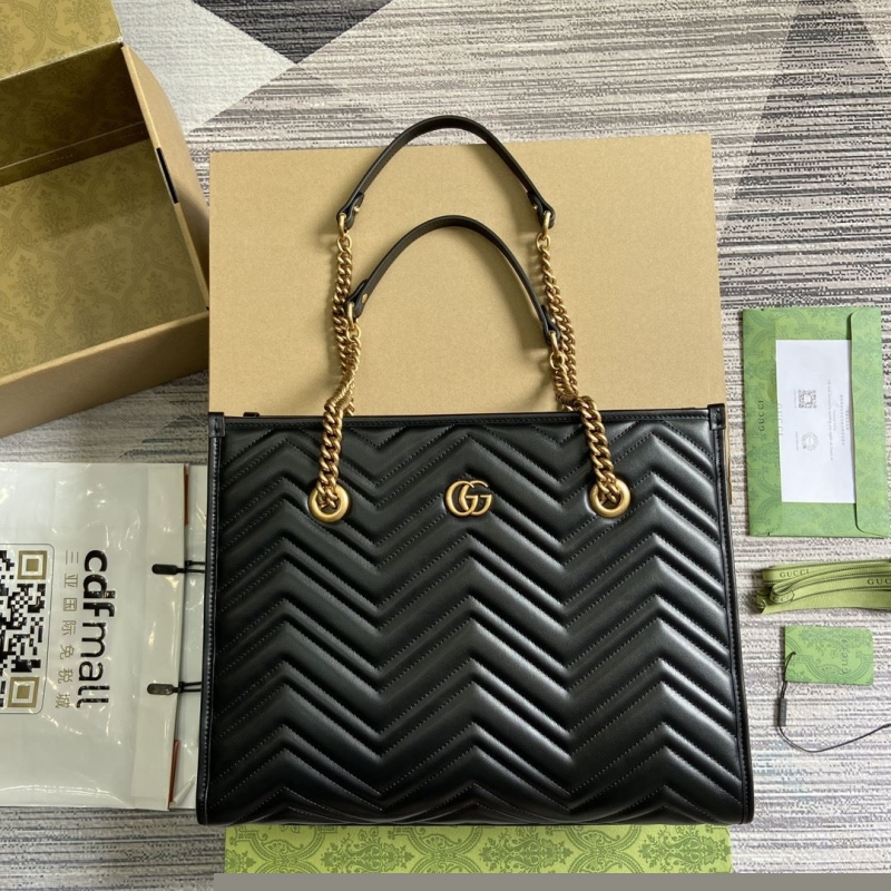 G*u*i shopping bags
